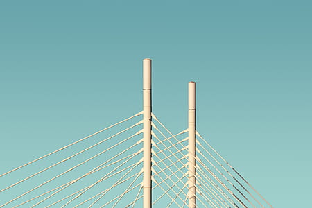 two white metal post at daytime thumbnail