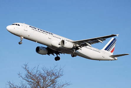 flying white airliner thumbnail
