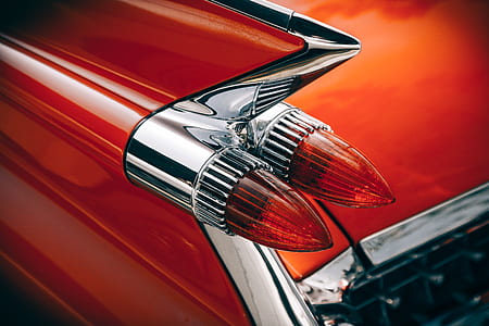 close photo of vehicle taillight during daytime thumbnail