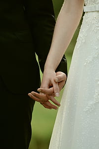 woman and man holding hands thumbnail