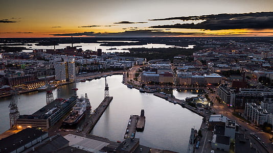 aerial photo of buildings during sunset thumbnail