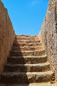 brown stone staircase under clear blue sky thumbnail