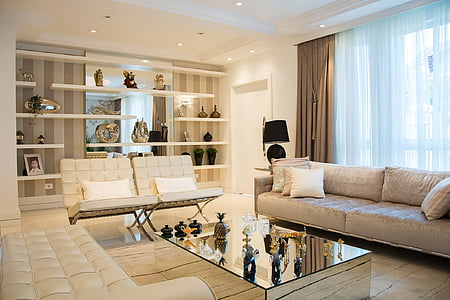 sofa set with coffee table near shelf thumbnail