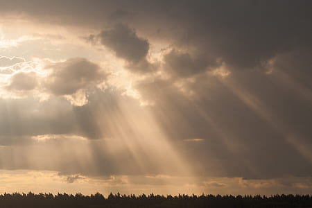 landscape photography of clouds and trees thumbnail