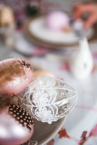 Easter table with cute pink decorations, flowers, catkins and eggs thumbnail