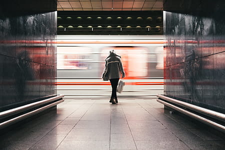 Woman Waits Train Speeds By Photo thumbnail
