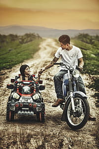 man riding on motorcycle outdoors thumbnail