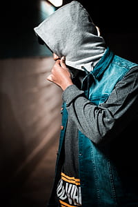 person wearing black and blue hoodie thumbnail