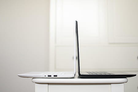 white and black laptop computers thumbnail