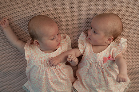 baby wearing pink dress thumbnail