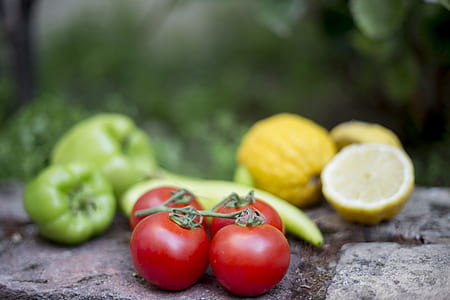 selective focus photography of four red tomatoes thumbnail