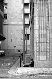 Grayscale Photography of Man on Pavement thumbnail