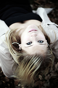 woman seating on floor thumbnail