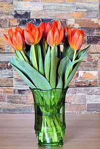 bunch of orange tulip flowers in green vase thumbnail