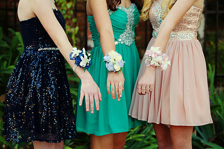 three women showing their floral bracelets thumbnail