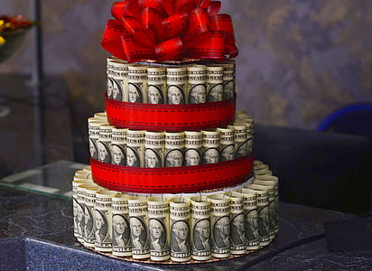 US dollar banknote cake on marble table thumbnail