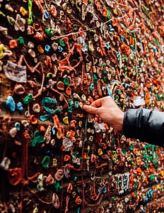 person touching brown wall thumbnail