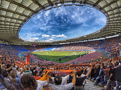 people watching football match in stadium thumbnail
