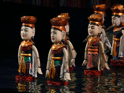 six female dolls on body of water thumbnail