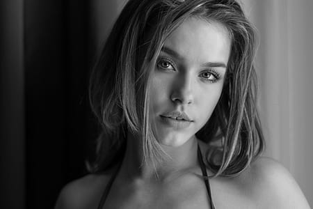 grayscale photo of woman wearing black string brassiere thumbnail