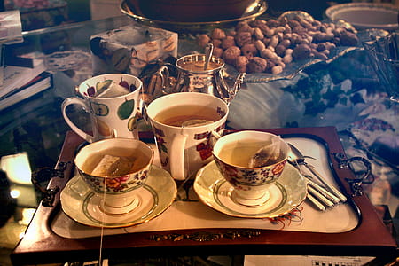 Breakfast Tea Cups Filled With Water, Milk and Tea Bags thumbnail
