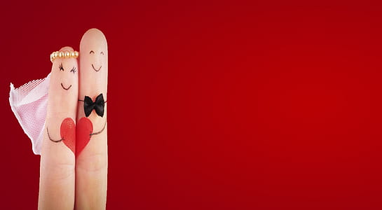 person's finger with bride and groom print thumbnail