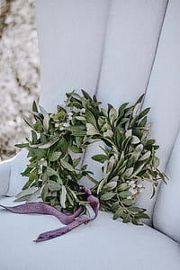 green leaf wreath on sofa chair thumbnail
