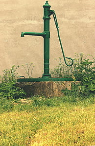 green deep water pump beside green plants thumbnail