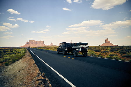 truck at the road through Grand Canyon, Utah thumbnail