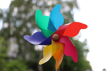 selective focus photography of red, blue, and green wind vein toy thumbnail