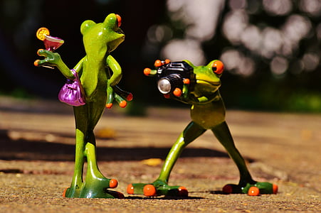 two ceramic frog figurines thumbnail