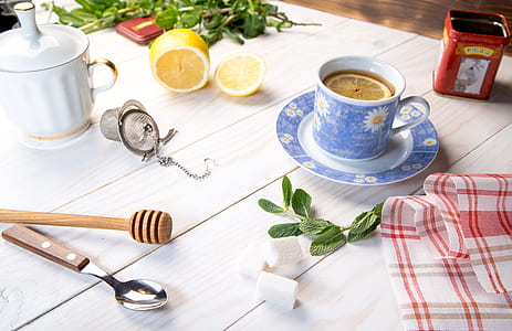 floral ceramic mug with sliced lemon inside thumbnail