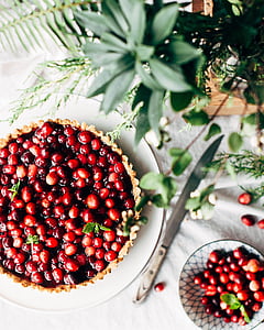 cherry fruits on plate beside knife thumbnail