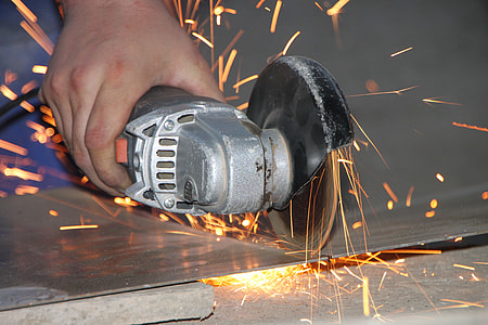 person holding grey angle grinder thumbnail