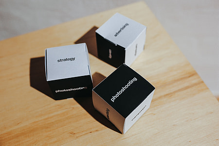 Little paper boxes with words on them thumbnail