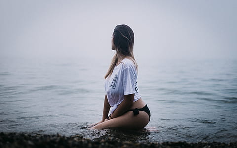 woman kneeling on water thumbnail