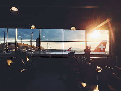 man standing at front of glass wall thumbnail