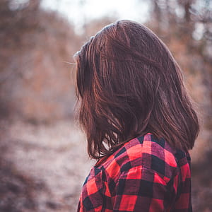 woman wearing red and black gingham sport shirt thumbnail