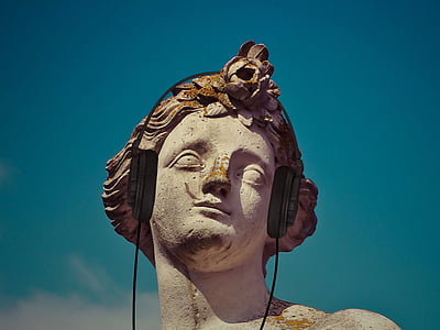 male statue with headphones thumbnail