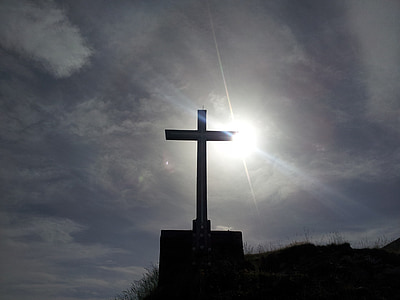 cross figure during daytime thumbnail
