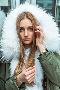 woman touching her hair thumbnail