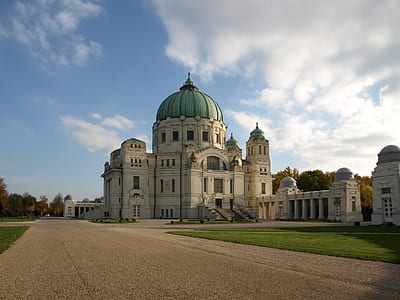 white cathedral under cloudy sky thumbnail