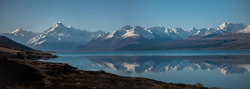 body of water and mountain thumbnail