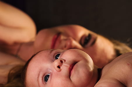 topless baby in selective focus photography thumbnail