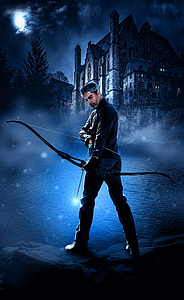 person holding composite bow thumbnail