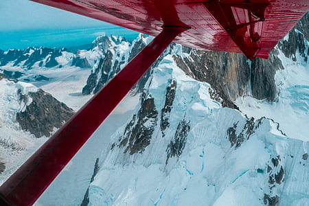 aerial photography of red airplane thumbnail