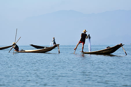 man standing on boat thumbnail
