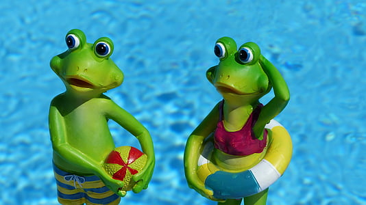 two green frog near body of water figurines thumbnail