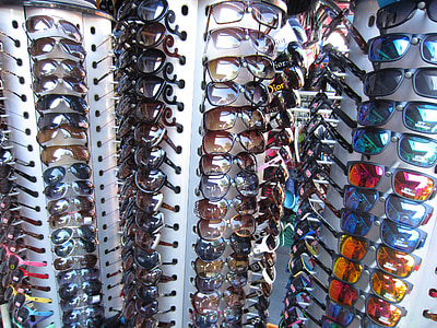 assorted sunglasses lot in close-up photography thumbnail