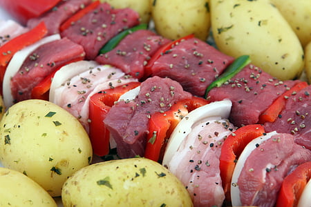 peeled potatoes and raw kebab thumbnail